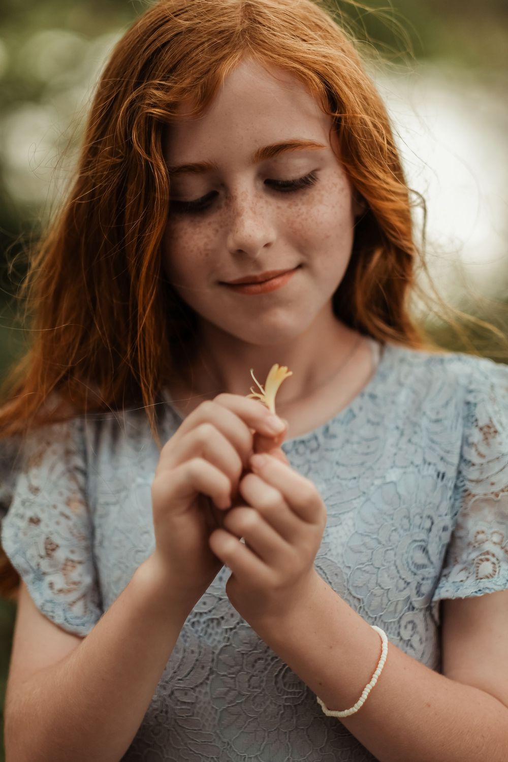 Young girl holding a flower during a Lafayette family photo session