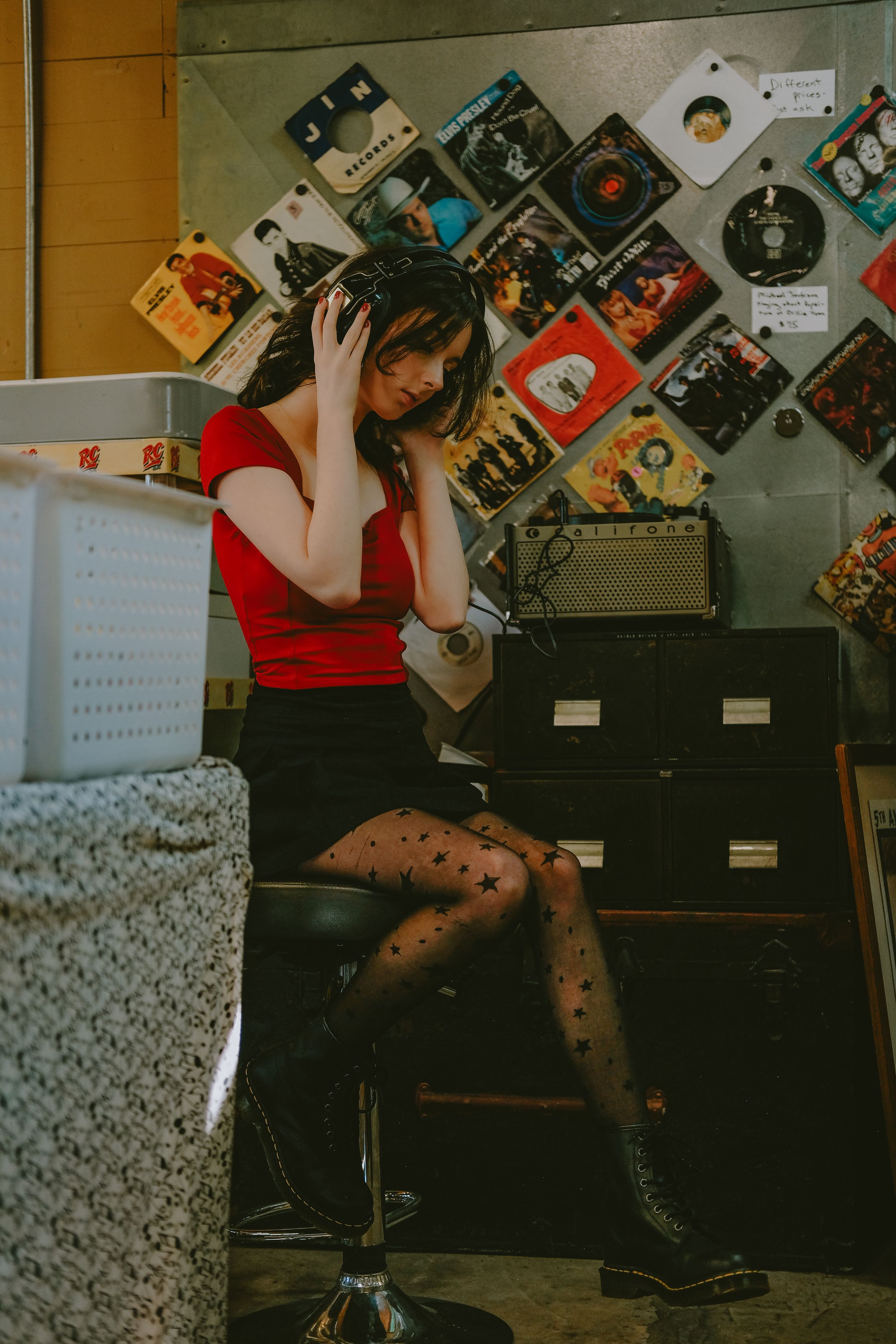 Creative portrait in a record store